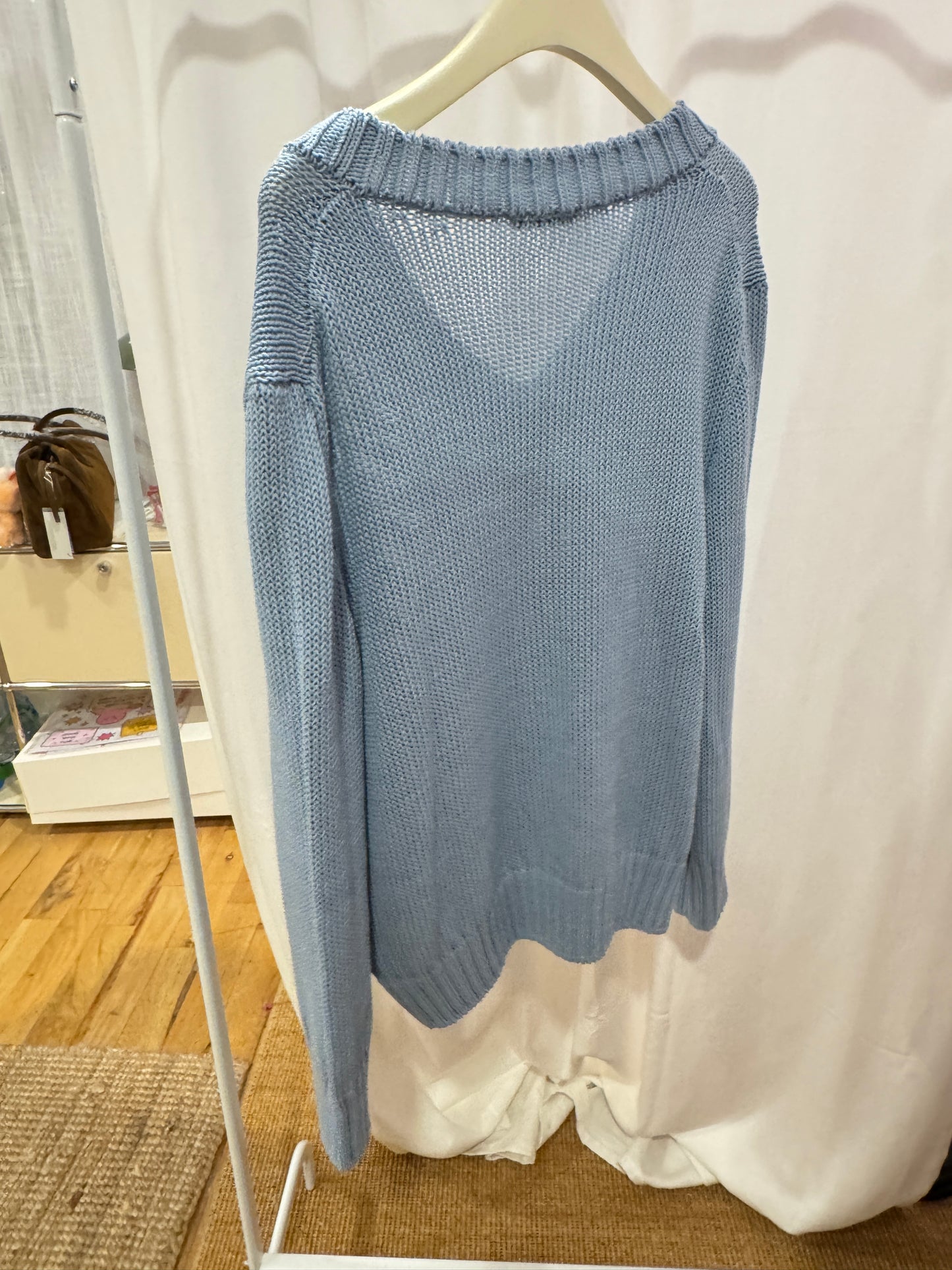 Blue V-neck knit top