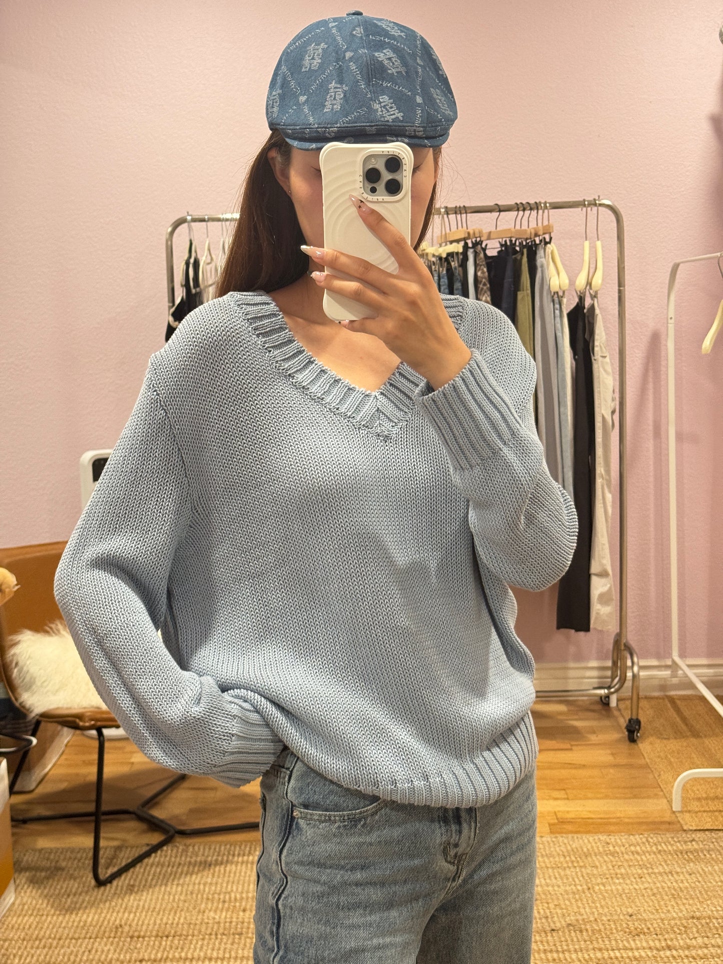 Blue V-neck knit top