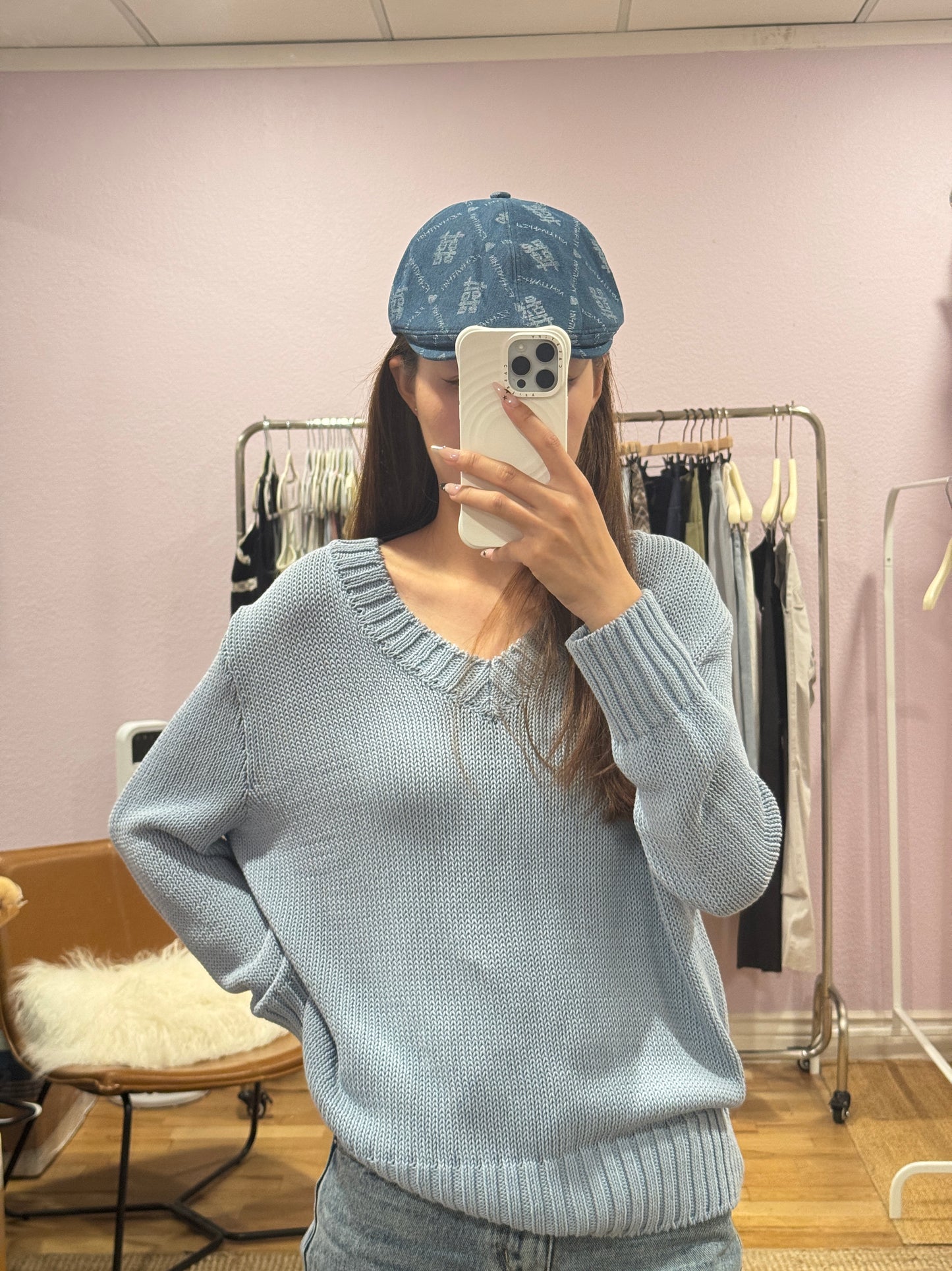 Blue V-neck knit top