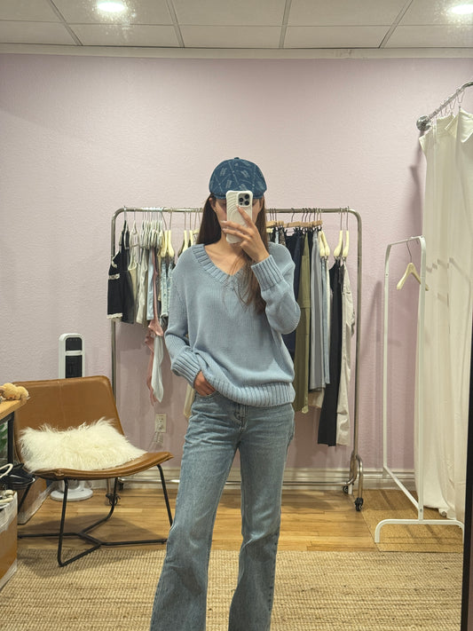 Blue V-neck knit top