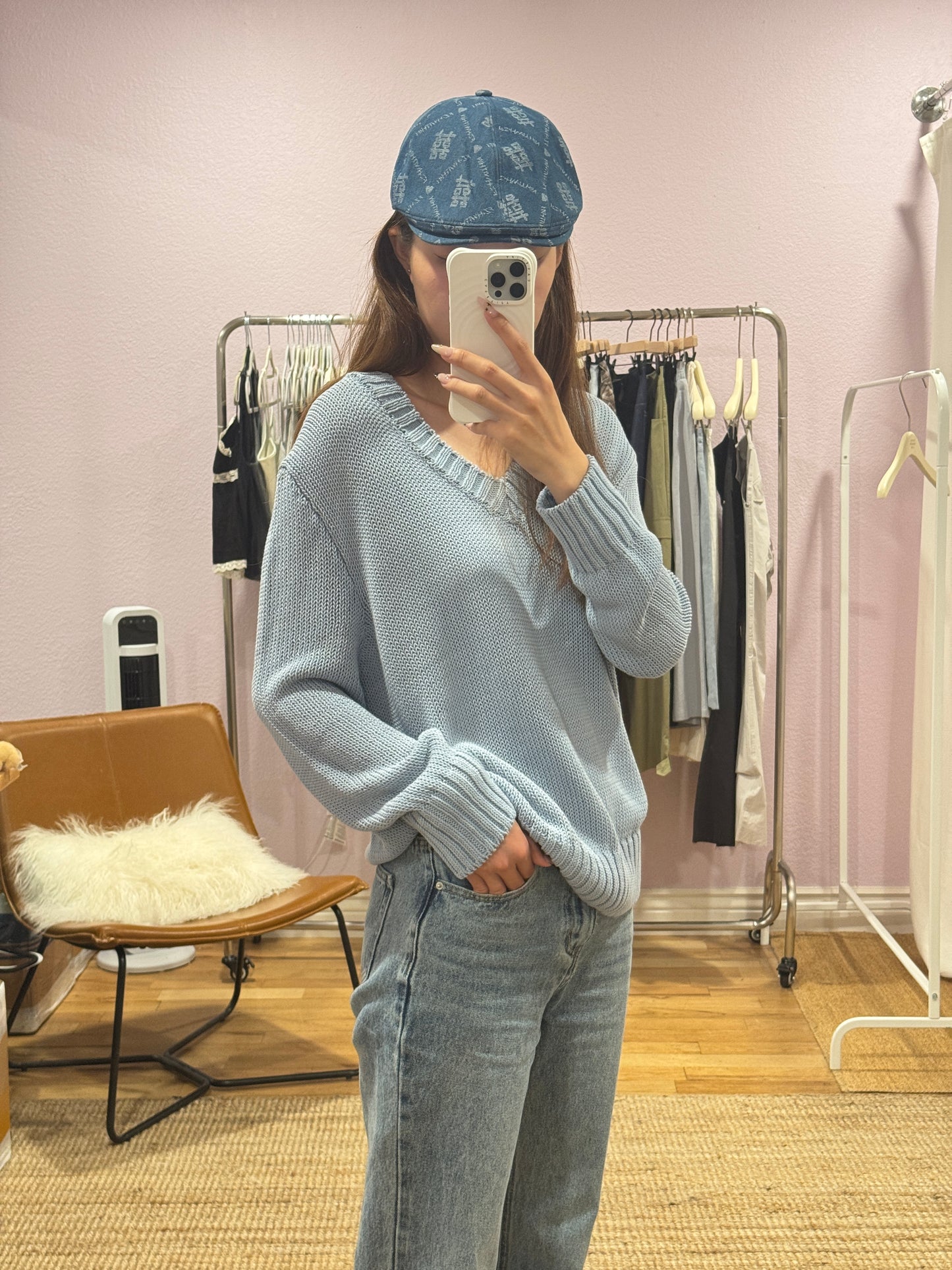 Blue V-neck knit top
