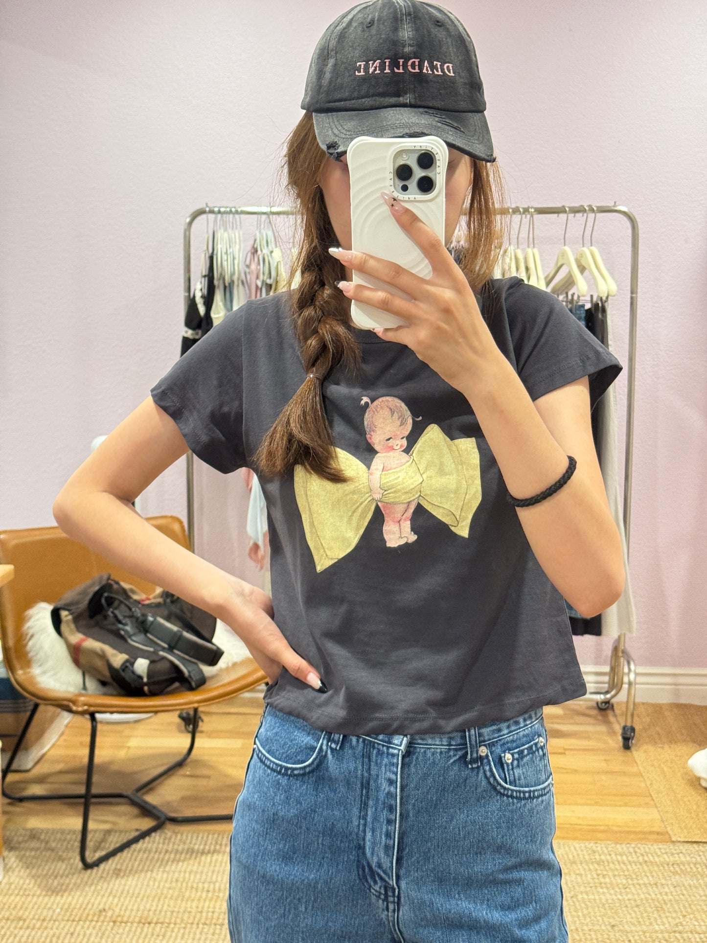 Cropped short-sleeve top with bow print