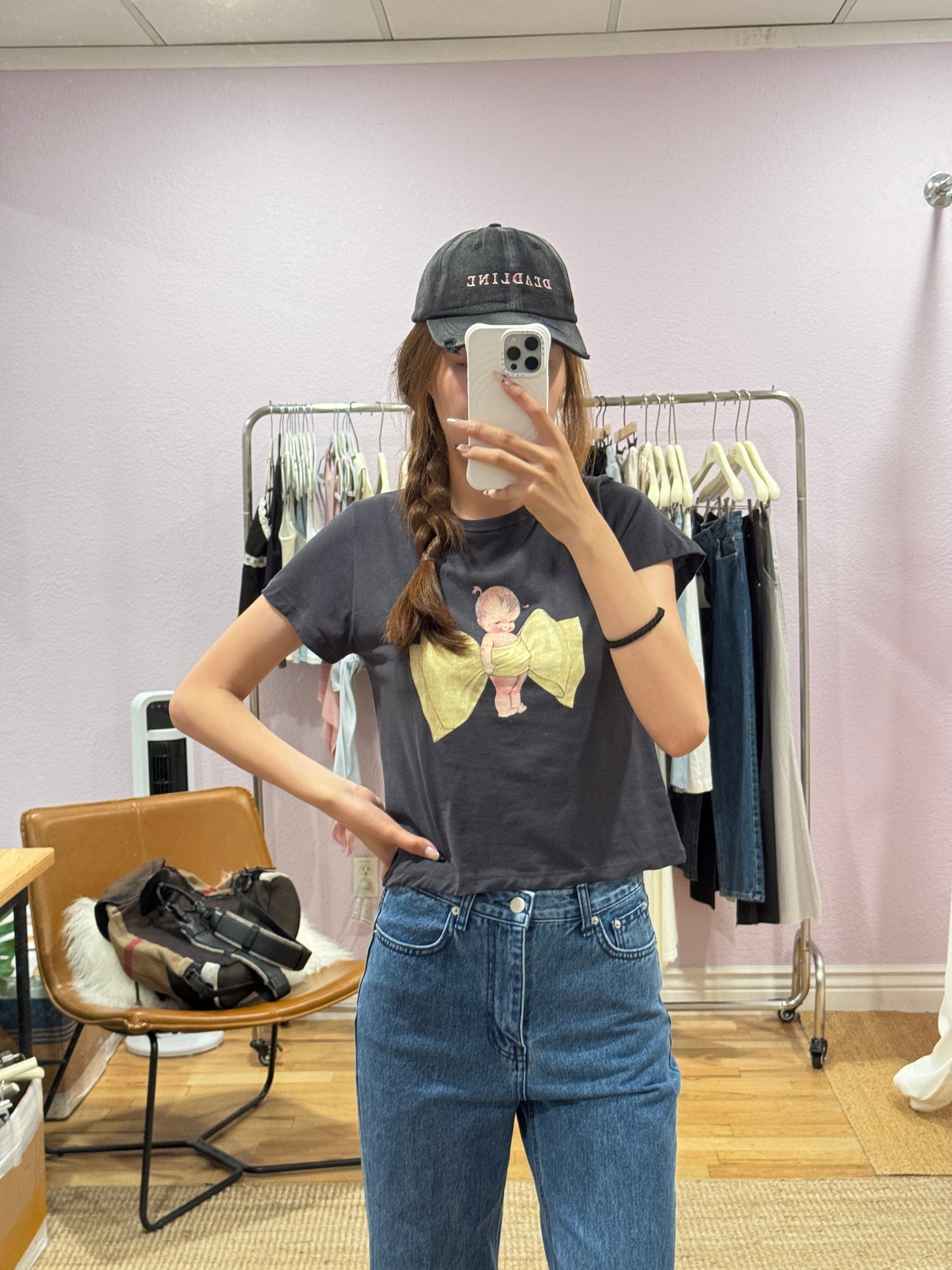 Cropped short-sleeve top with bow print